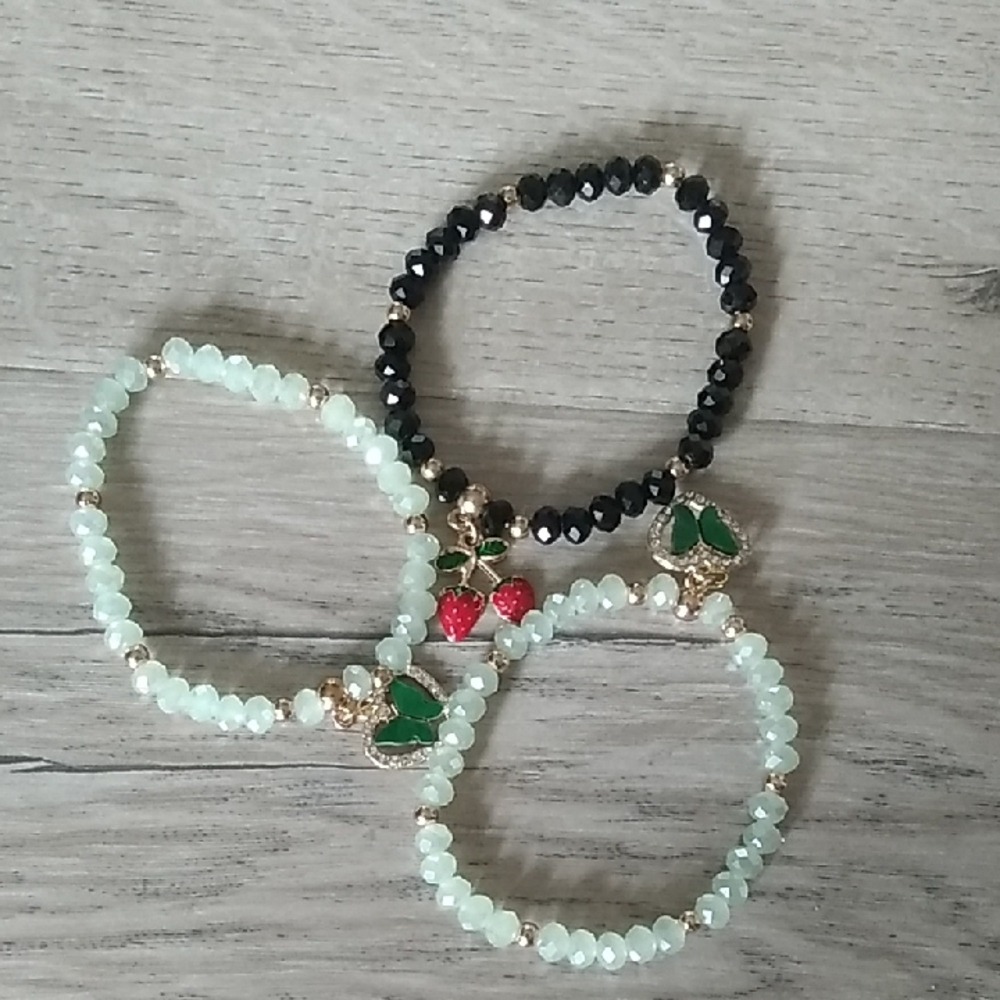 Set of Beaded Bracelets with Charms